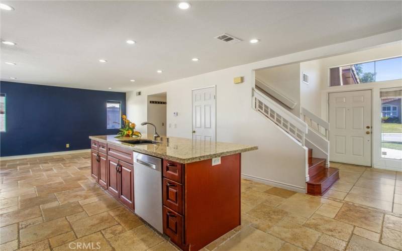 Kitchen, dishwasher, dining room in background