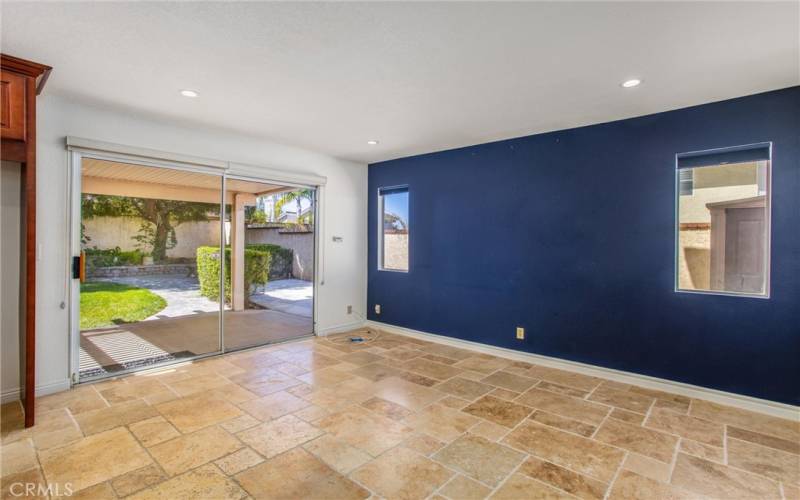 Dining room with sliding glass door to patio and backyard