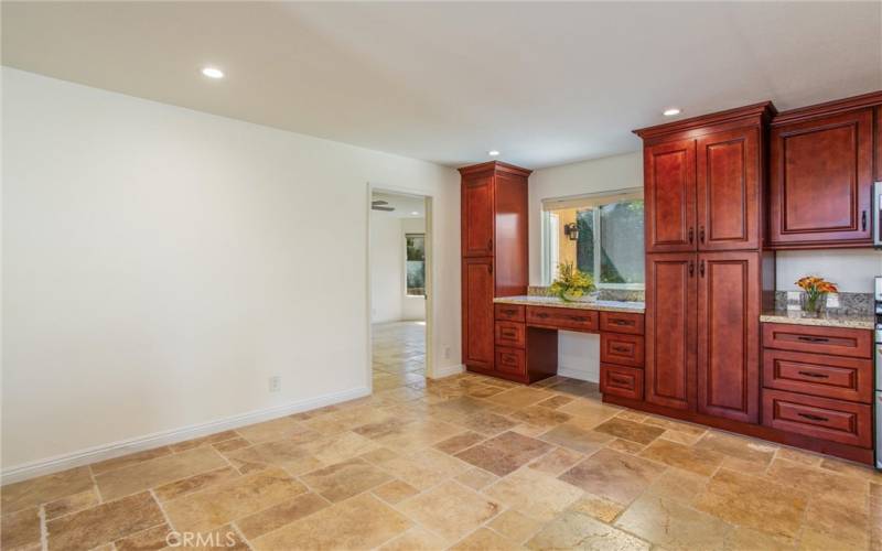 Extended Family room with cabinetry and desk builtin