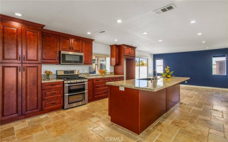 Kitchen with island, 

cabinetry