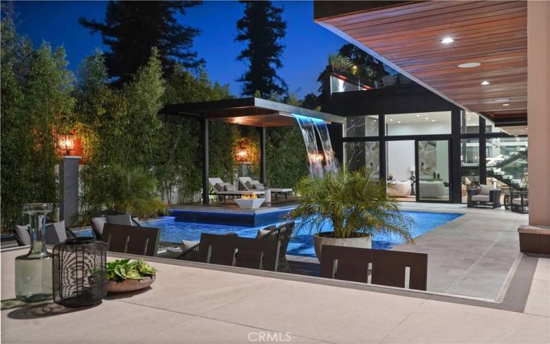 Splendid Backyard...no Expense was Spared!!! This Paradise features Sparkling Pool & Spa w/ Glass Tile Surface, Sumptuous Covered Patio by the Pool w/ Waterfall & 2 Fire Pits.