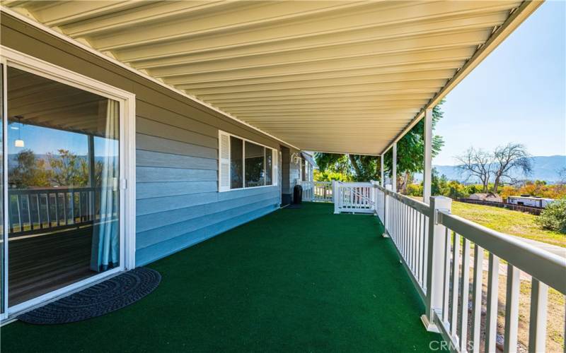 Huge front patio , Its a WOW . Great place to Put a card table , when you have the buys or gals over , and enjoy the valley views