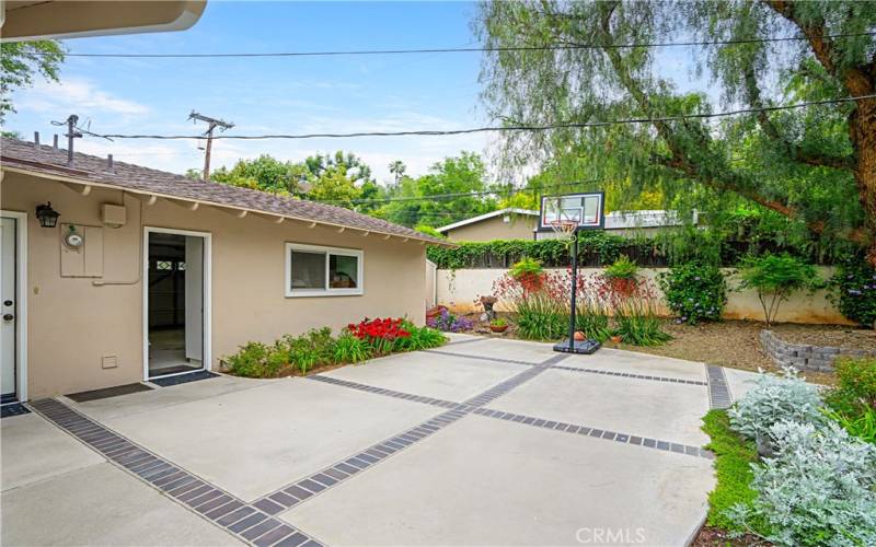 The garage has a back entrance to the back yard.