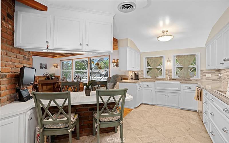 View looking over the breakfast bar tot he dining room