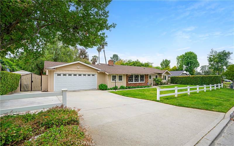 The wide front driveway has room for possible RV parking.