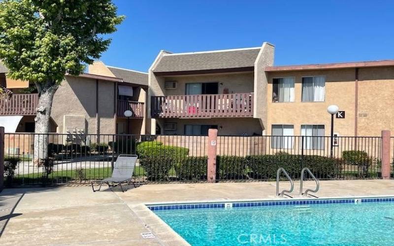 Top Unit with Balcony overlooking the sparkling pool!