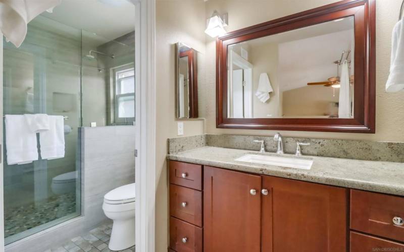 Luxurious appointments with walk- in shower.