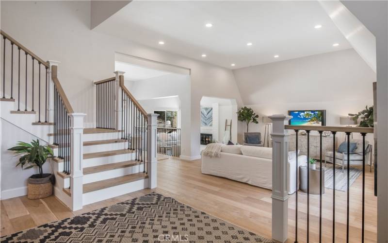 Entry welcomes you to stunning architecture, high ceilings, gorgeous hardwood floors.