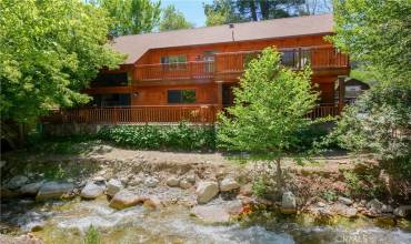 Back side house with creek