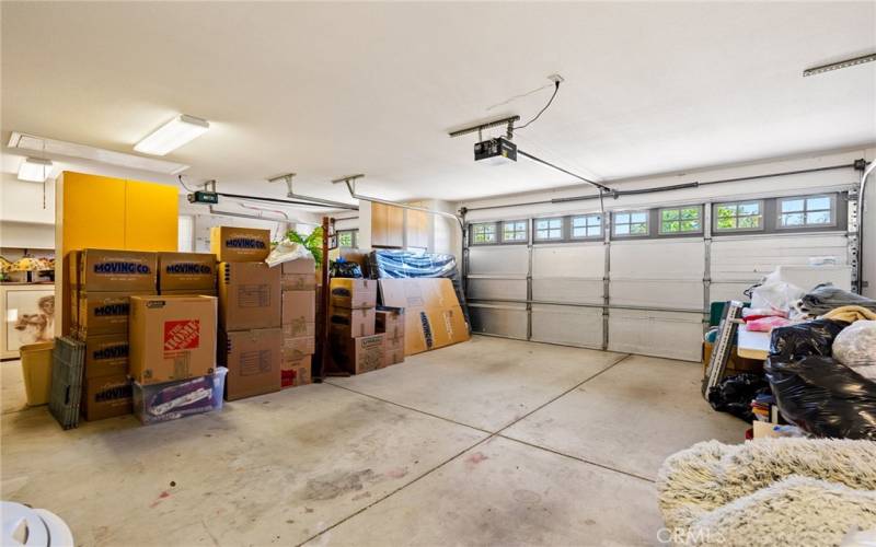 Spacious garage, includes attic pull down for more storage