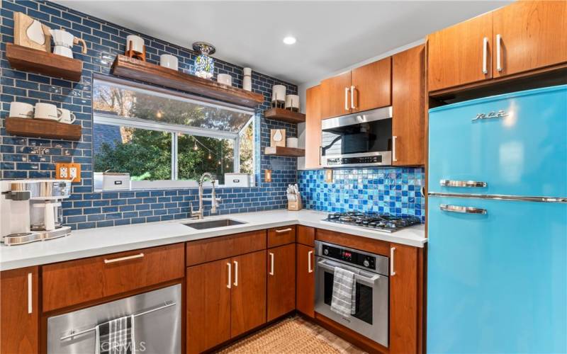 updated kitchen with Vintage style RCA fridge & dishwasher drawer