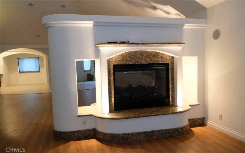 Double sided gas fireplace