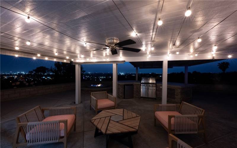 City light views under your lighted backyard patio.