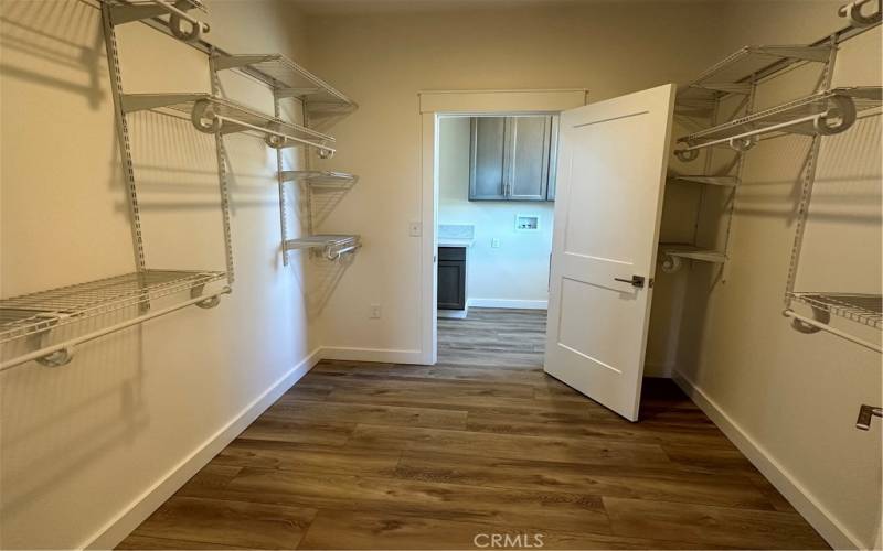 Large Walk in closet w/access to the utility room