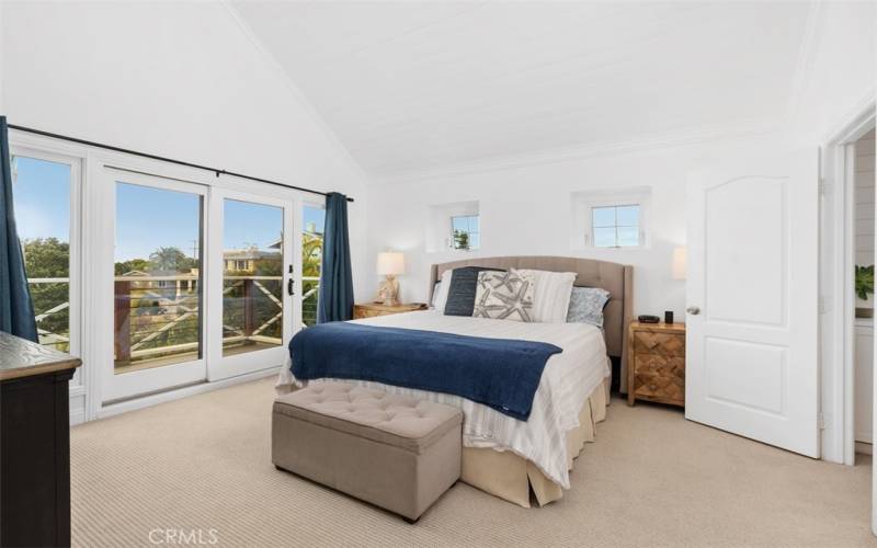 Primary Bedroom with ocean view off private balcony