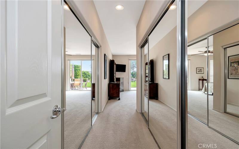 Primary suite entry w/mirrored closets on both sides!