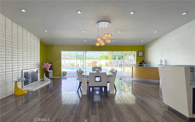 Upon entering the home you are immediately met with the light and bright view of the pool and backyard.
