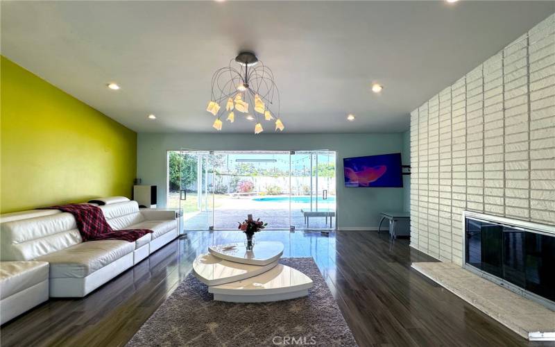The family room offers plenty of space along with pool and backyard views!