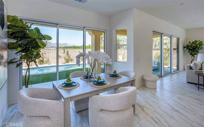 Kitchen Nook w/bi-fold door exit to backyard Oasis