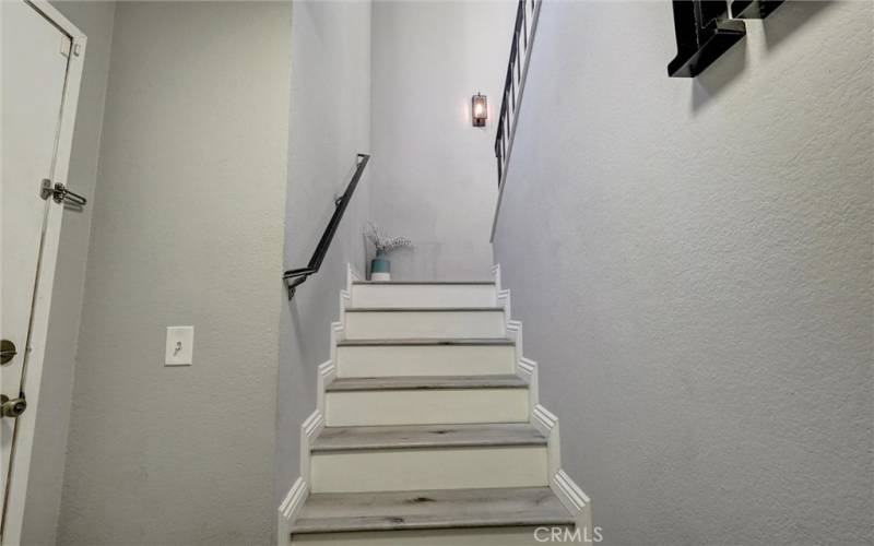 Stairs from the entryway to the main living space