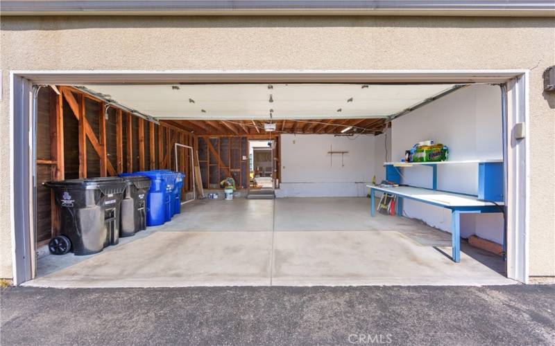 2 car garage showing door to patio and home