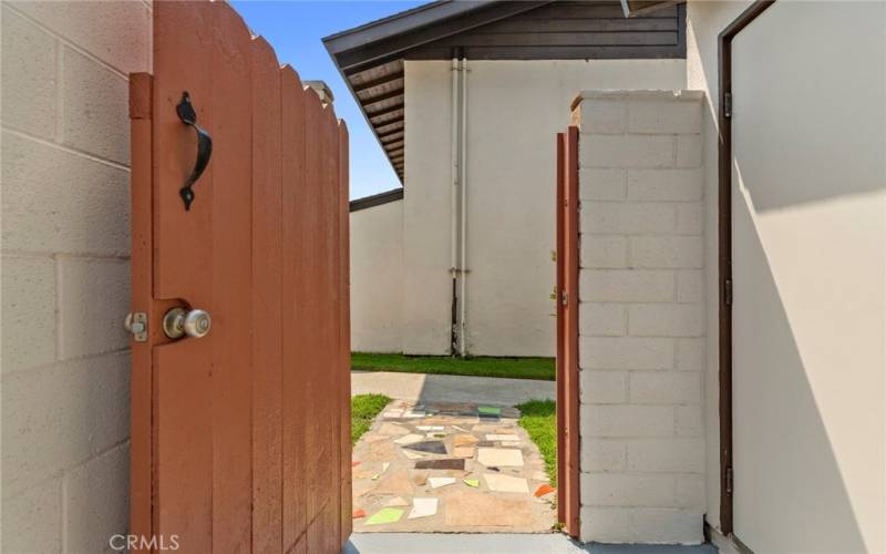 A secondary access to the patio is from a secured side gate...great for guest entry when entertaining and when loading and unloading large items into the home....*Pictures are from previous listing.