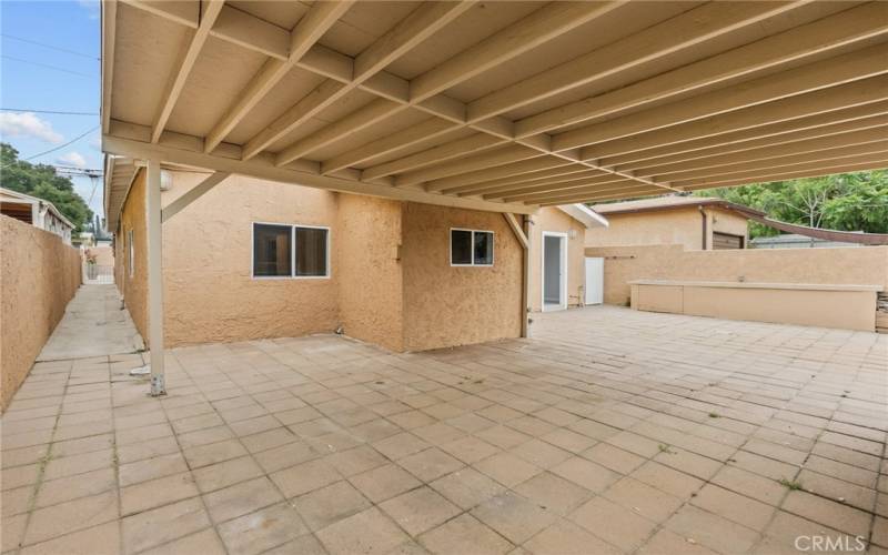 back carport area with alley access