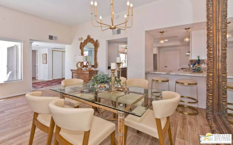 Dining area w/breakfast bar in background