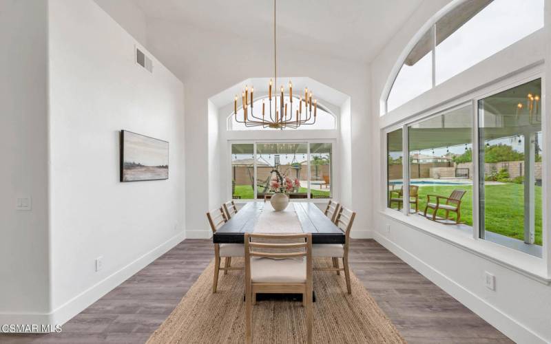 Formal dining with backyard views