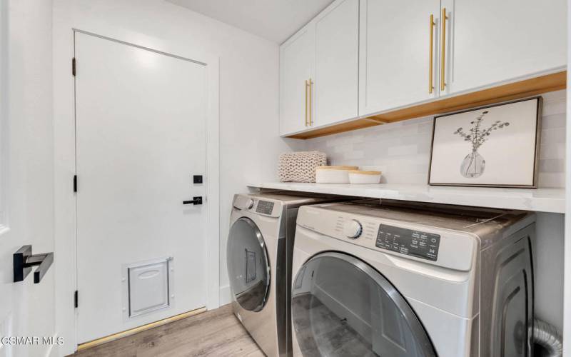 Laundry w/quart counters & new cabinetry