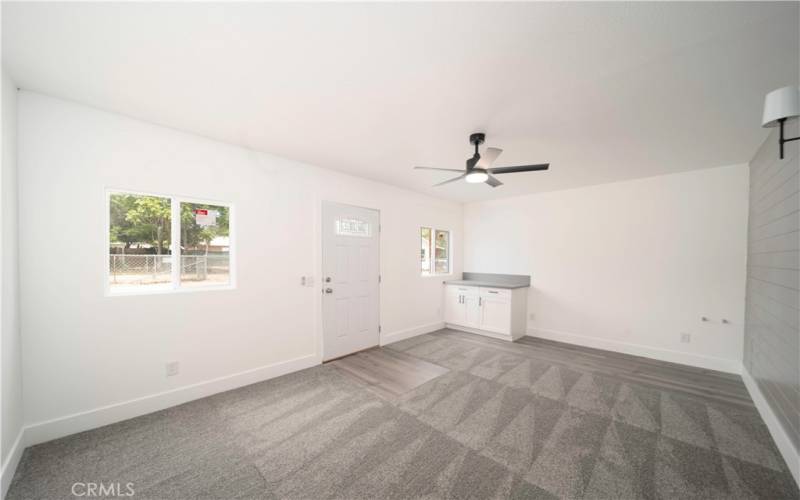 Bonus Room includes new vinyl plank flooring, new windows new ceiling fan, new cabinets with quartz counter top.