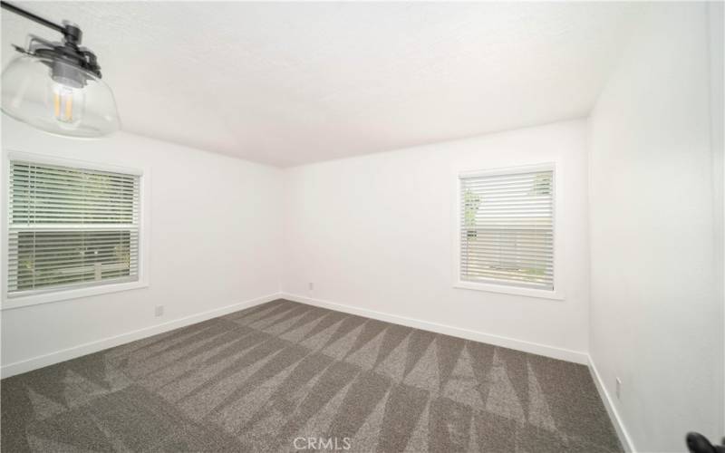 Bedroom 2 includes new windows, carpets, lighting door and paint