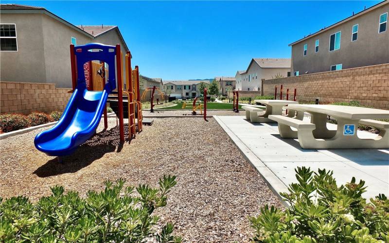 Inside community Playground with Picnic Benches