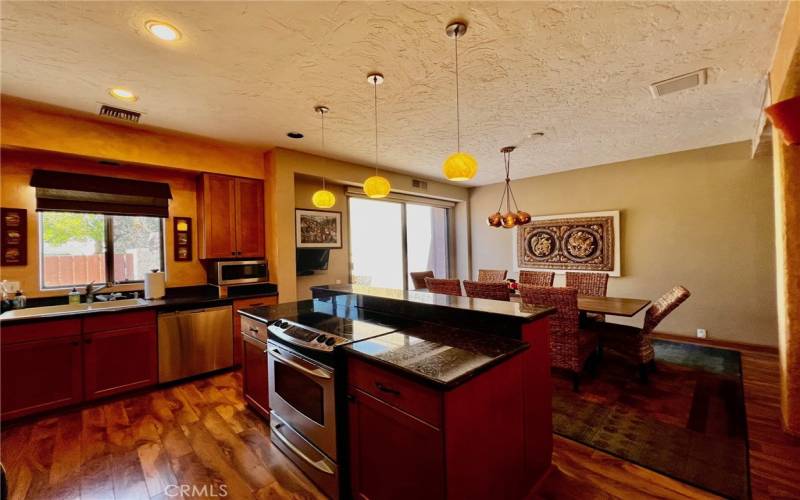 Living room with double sliding door entry/exit access.