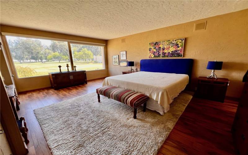 Primary Bedroom with natural light pouring in.