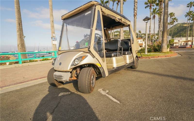 Golf cart being sold with the condo