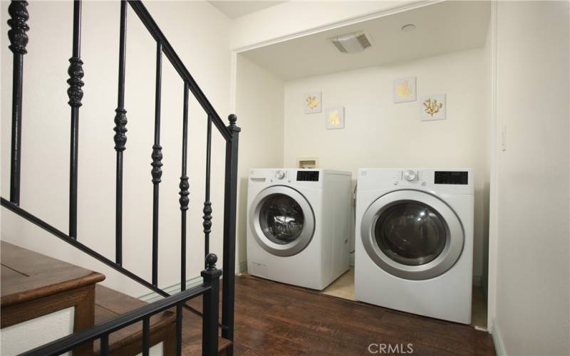 Washer and dryer are located on the second floor hallway.