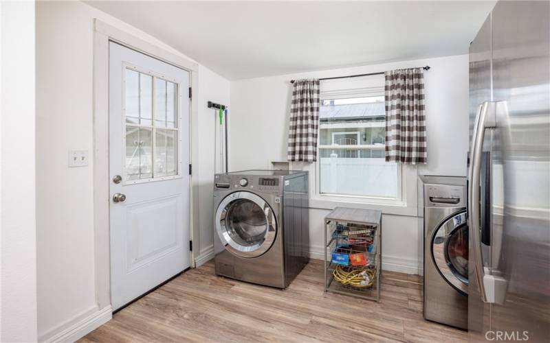 Laundry off Kitchen with Door to Backyard