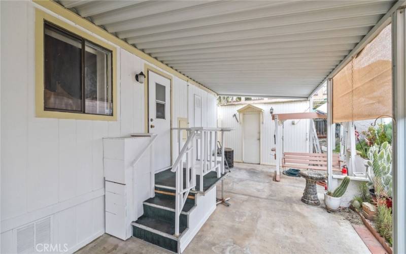 Side door and Patio Area And 8' x 14' Shed entrance