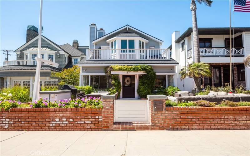 On a prime walk street only 5 houses from the beach!