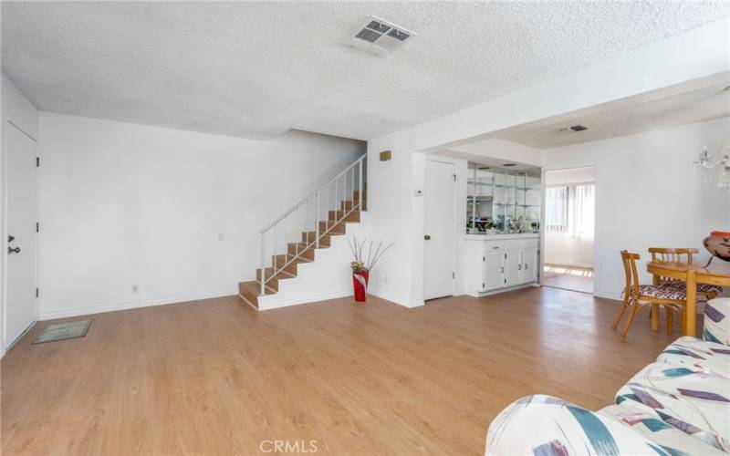 Stairs in Living Room, Storage Closet, Wet Bar, Dinning area