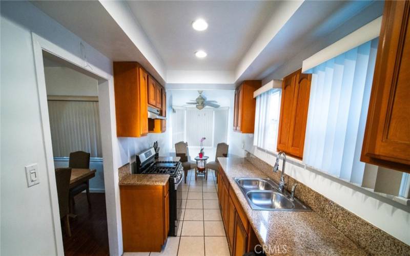 Dining room to kitchen with breakfast nook