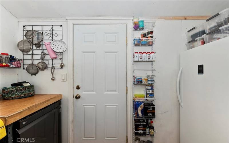 Utility Room with Dryer and Refrigerator/Freezer