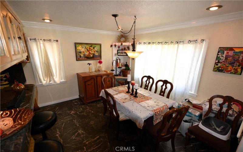 Lovely crown molding in this separate and formal dining room.