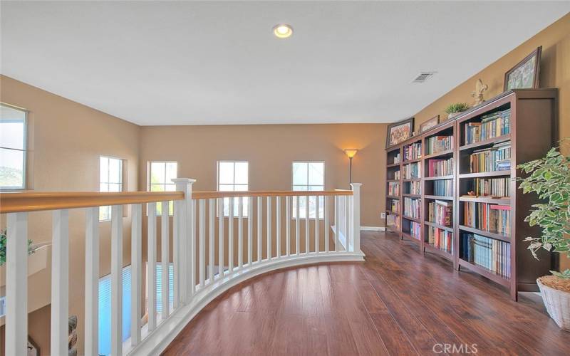 Library area at top of the stairs