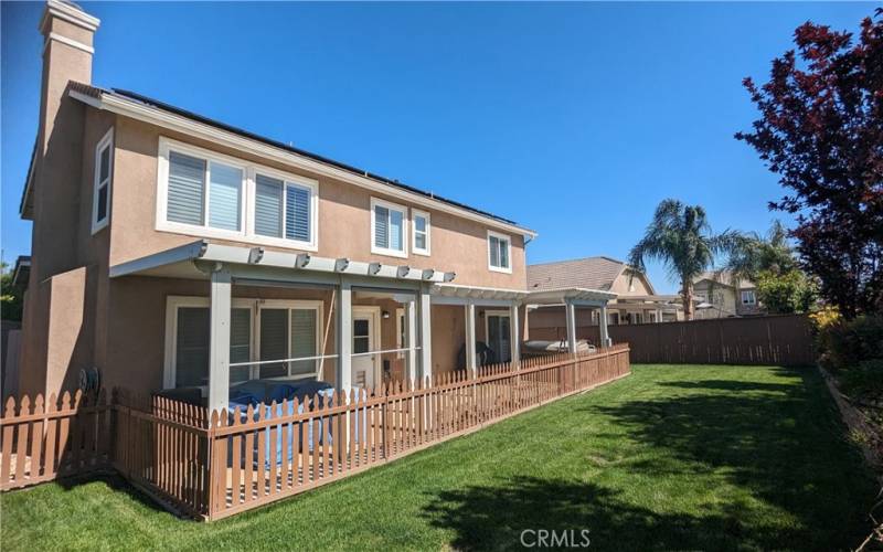 4 Covered Patios and a Large Fenced Grass Yard to Enjoy!
