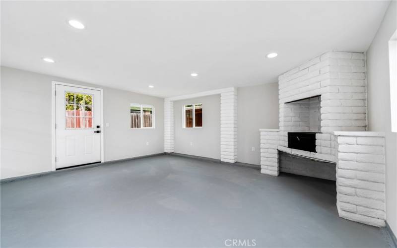 This space is perfect as an office, work out area, kids play room and 2 doors to the backyard!