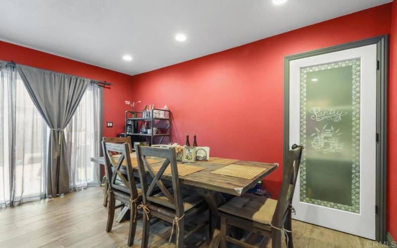 Located in kitchen this dining area nook is perfect place to enjoy your meals.