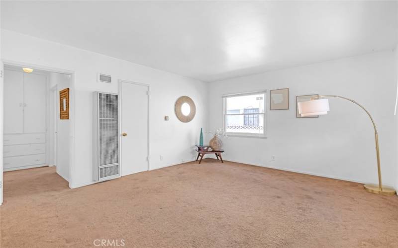 Front unit living room. Hardwood under carpet