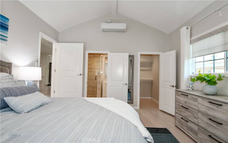 Primary bedroom with walk-in closet and en-suite bathroom